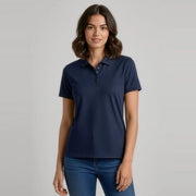Womens Aero Short Sleeve Polo P815LS worn by model in Navy